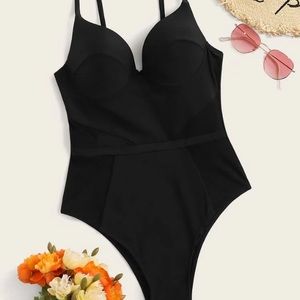 Never Worn. Black bathing suit with mesh detail.